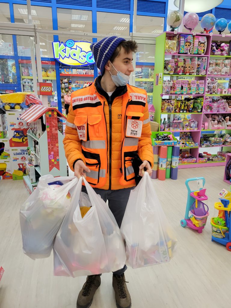 Lavee buying toys for the children.